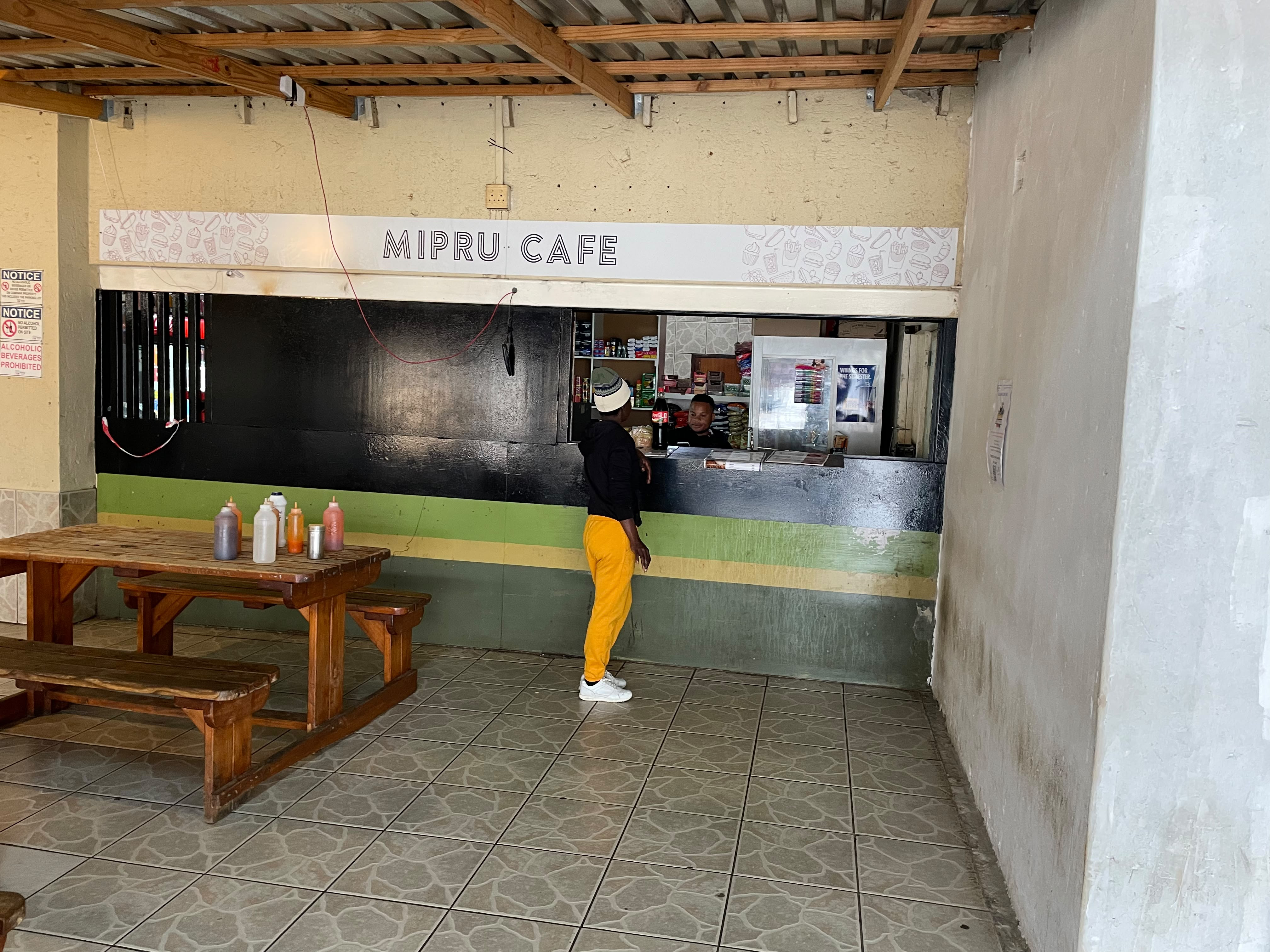 Mipru's Kitchen founder and team serving food